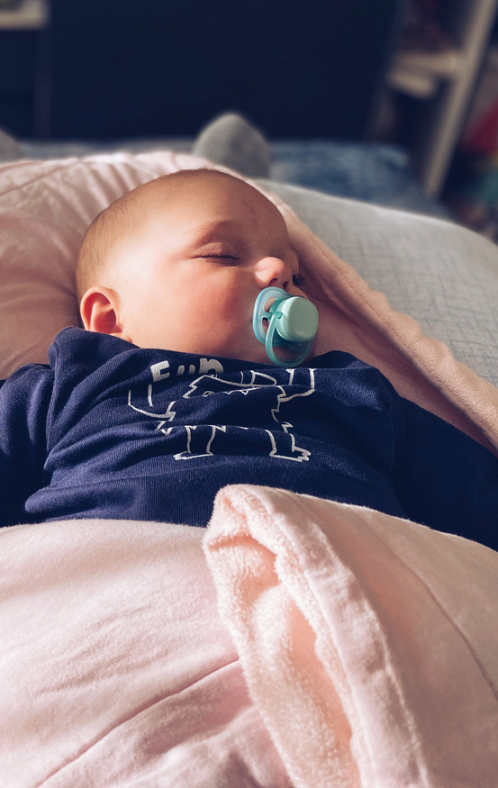 baby sleeping with pacifier